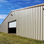 Tan steel agricultural storage building