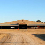 Covered cattle and livestock steel building